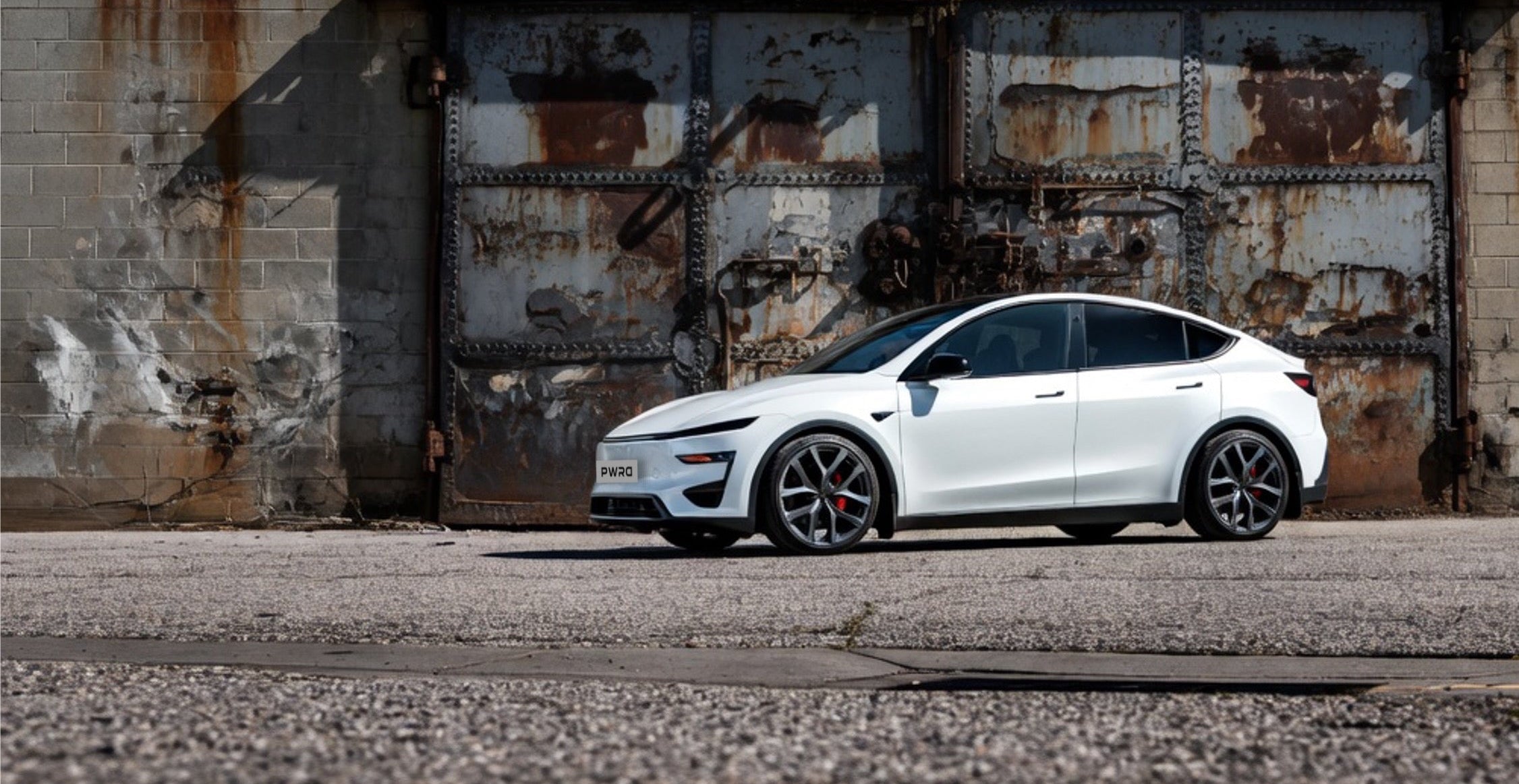 Lowered Tesla Model Y Juniper Performance with PWRD wheel spacers and lowering springs for flush stance