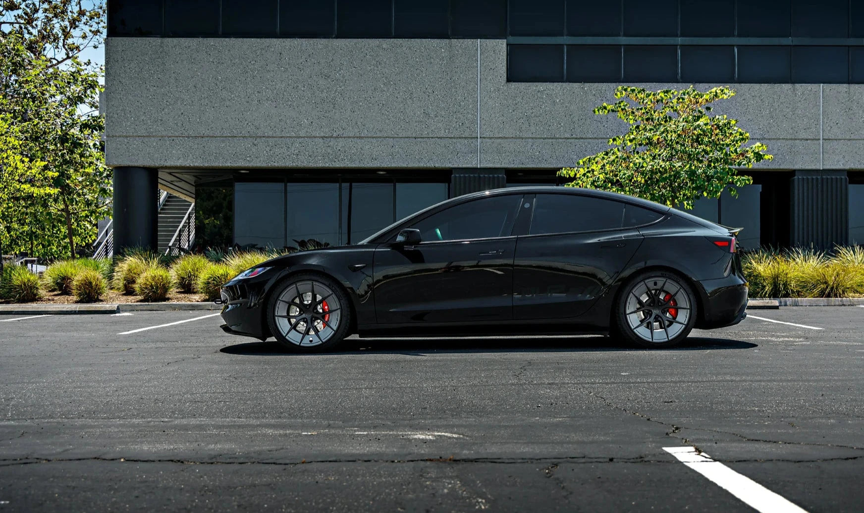 Black Tesla Model 3 with indestructible UP-RW Alloy Wheels
